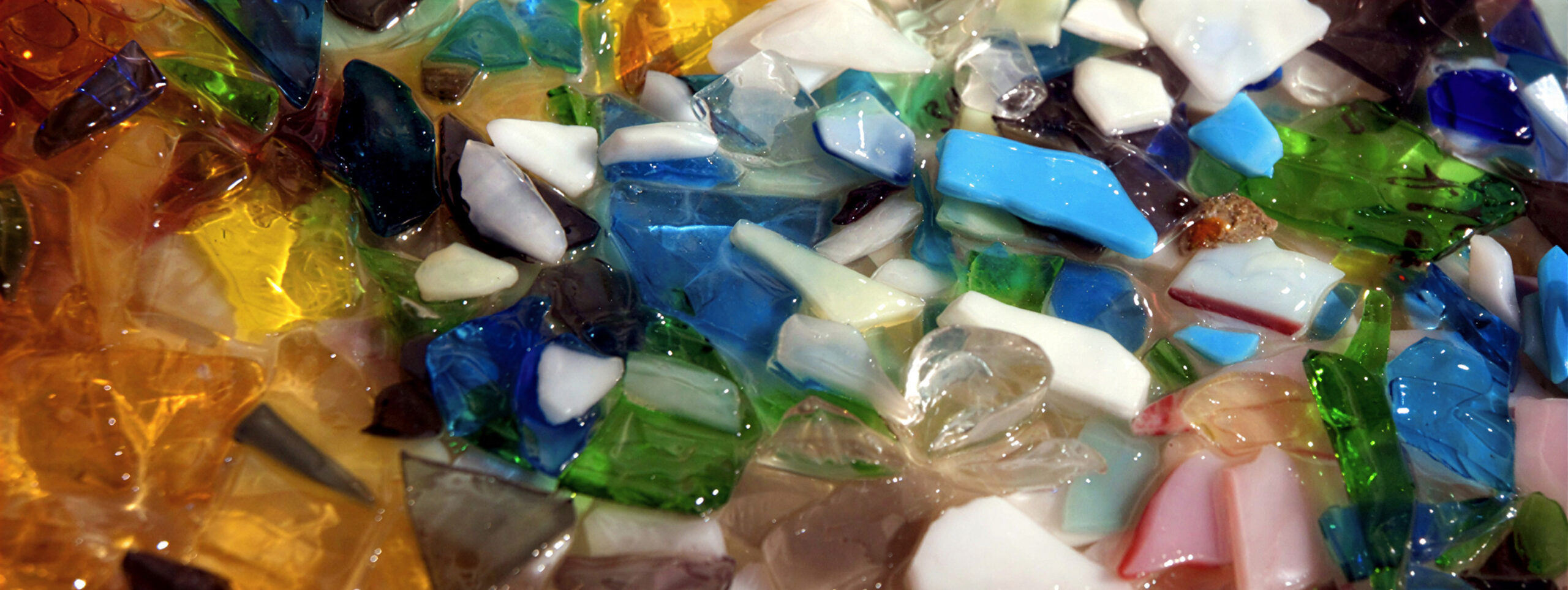Colorful mosaic of shattered glass pieces.